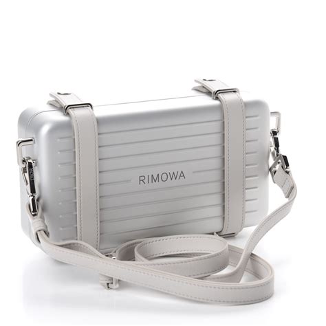 christian Dior silver strap clutch